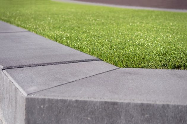 laying artificial grass on concrete